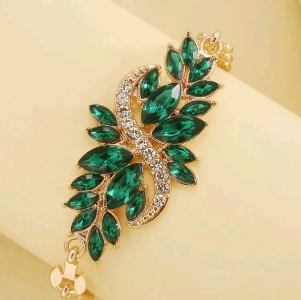 Gold and emerald rhinestone bracelet